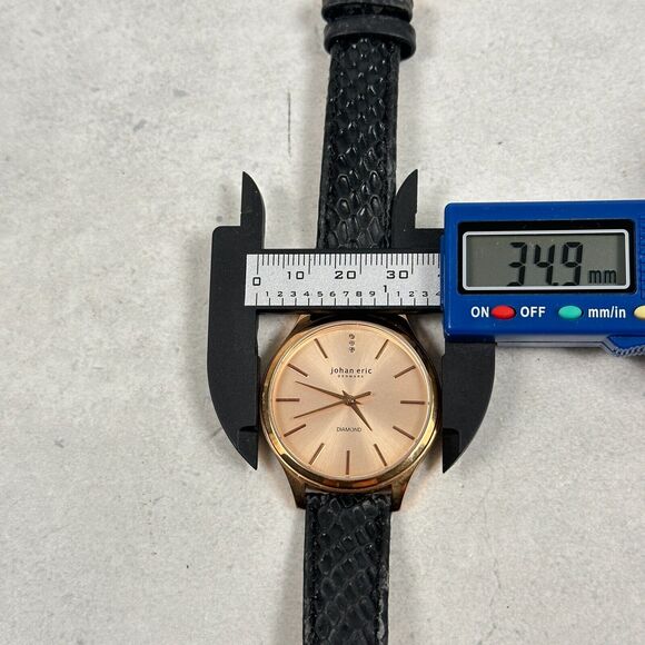 Johan Eric Watch Womens 35mm Gold Tone Black Band Diamond Quartz New Battery - Picture 10 of 12